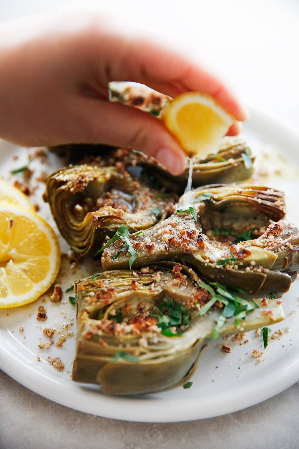 Braised Artichokes with Garlicky Pecan Bread Crumbs