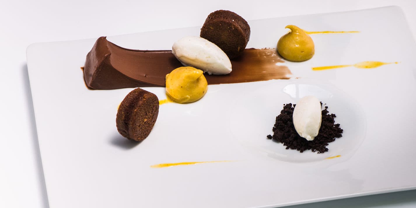 Madagascar – Pink pepper chocolate dessert with banana and passion fruit sauce