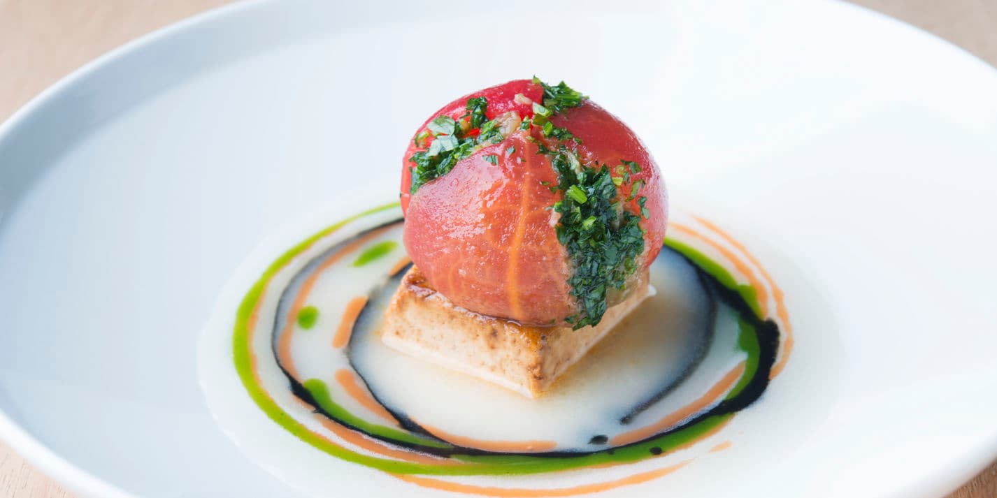 Roasted tofu with tamari, aubergine flower and tomato emulsion